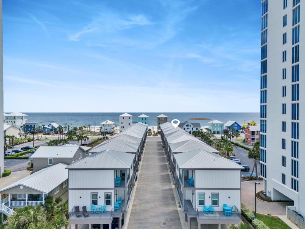a view of the beach from a building at Little Lagoon Beach House by The Madison Liv Collection in Gulf Shores
