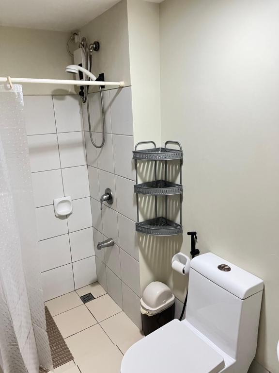 Koupelna v ubytování Magsayo Cozy Room