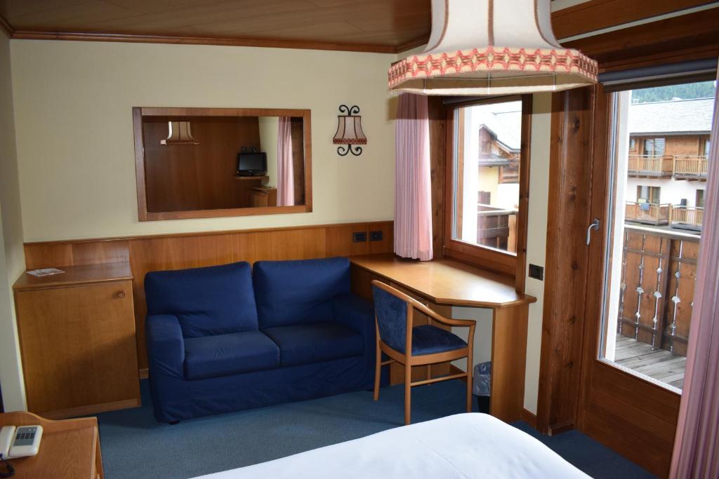 Χώρος καθιστικού στο Hotel Victoria