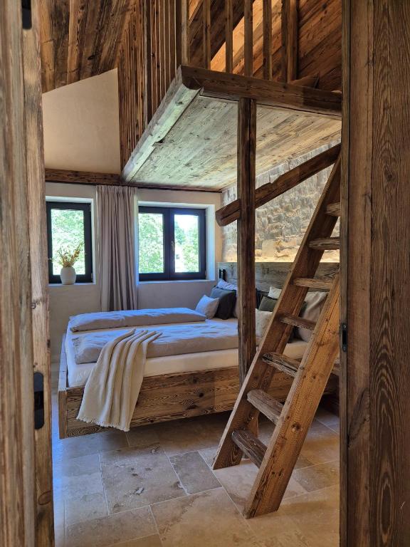 Voodi või voodid majutusasutuse Chalet Hideaway Alpi toas