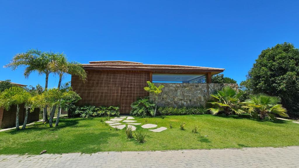 Gallery image of Casa Alto Padrão com Piscina e 5 Quartos, sendo 4 Suítes - Cond Praia Bella, Praia do Forte in Praia do Forte