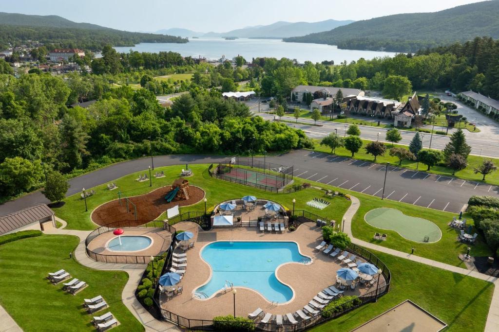 an aerial view of a resort with a swimming pool at Holiday Inn Resort Lake George - Adirondack Area by IHG in Lake George