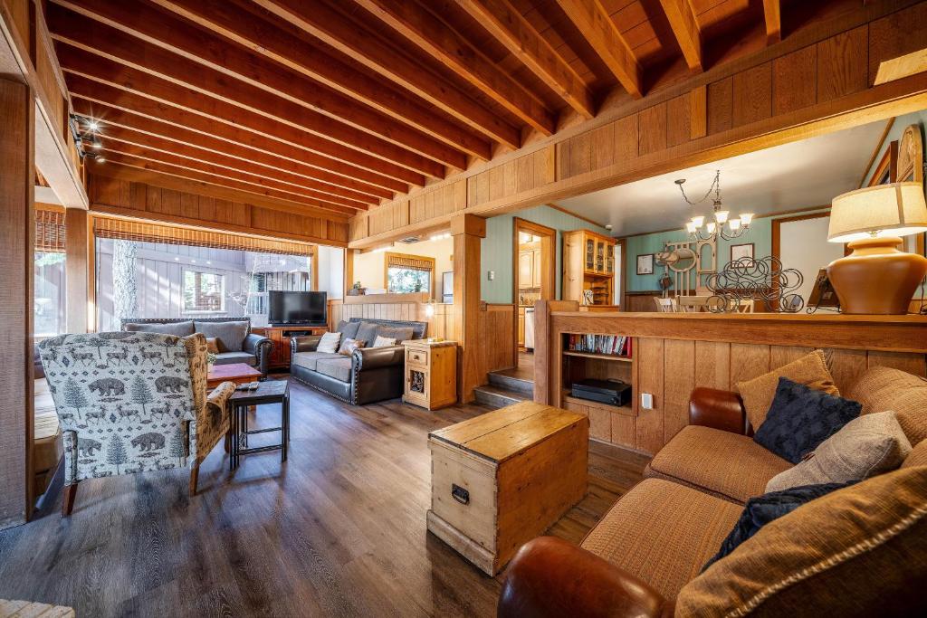 a living room with a couch and a table at NorthShore # 47 By Hauserman Rentals in Tahoe City