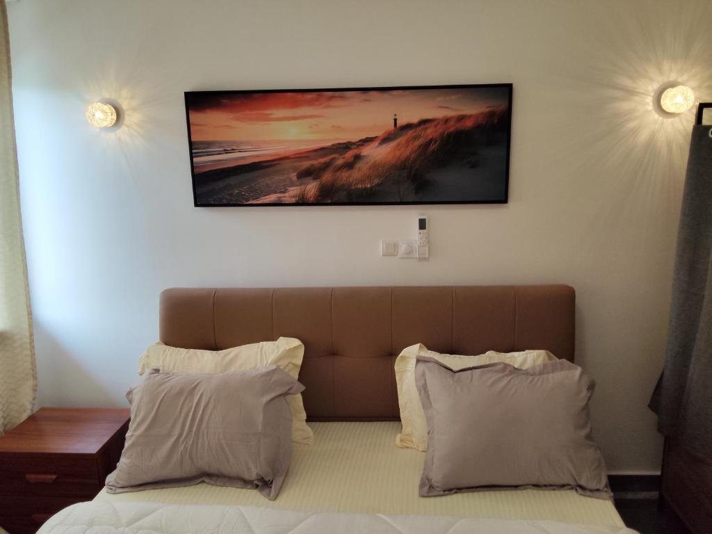 Postel nebo postele na pokoji v ubytování ASTRA Home