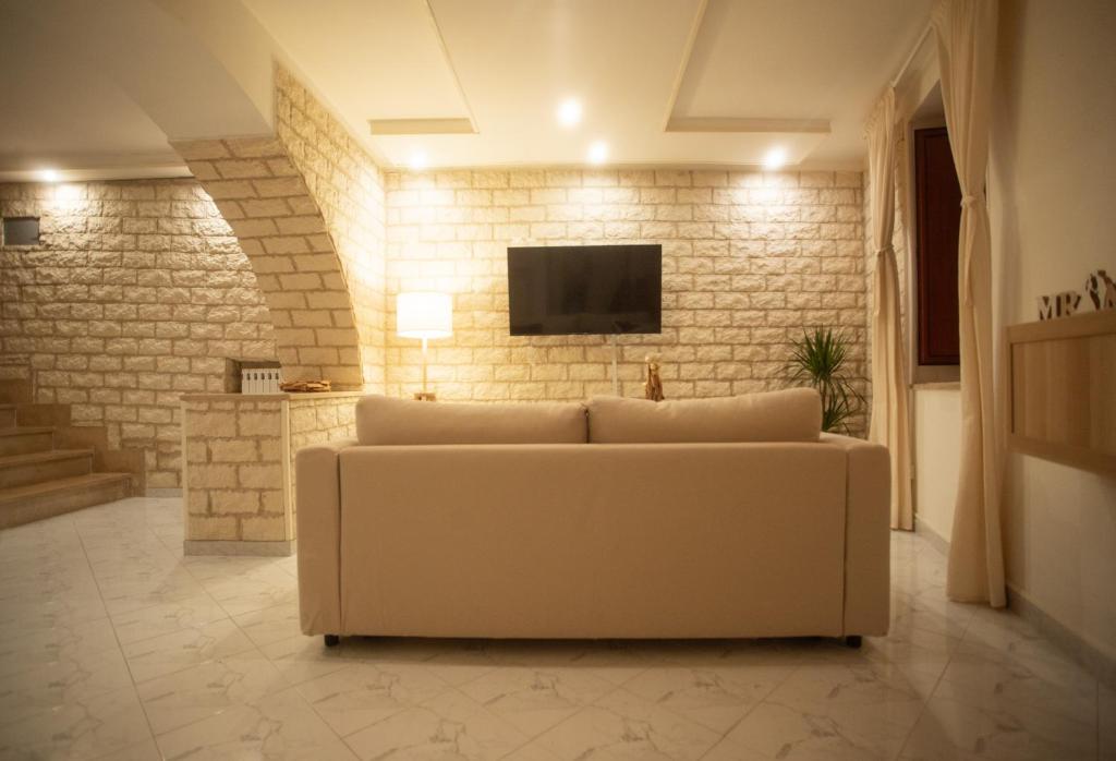 TV a/nebo společenská místnost v ubytování ilrifugiosalerno