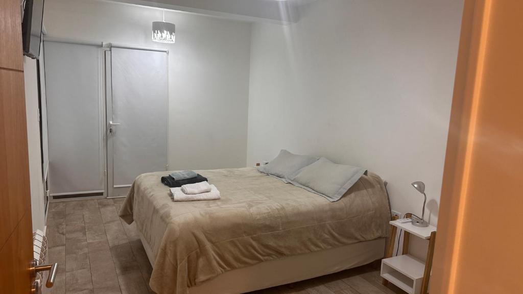 Ένα ή περισσότερα κρεβάτια σε δωμάτιο στο Duplex Jardines del Rey