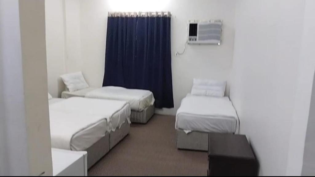 Ένα ή περισσότερα κρεβάτια σε δωμάτιο στο Hotel Dar Al-Ashraf Madina