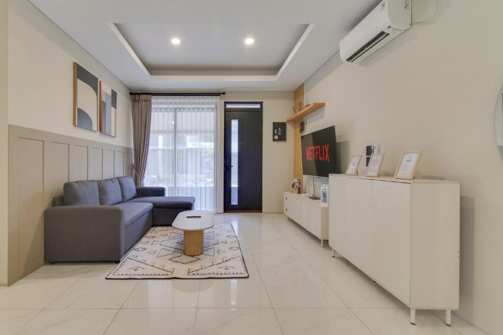 Χώρος καθιστικού στο 3BR Villa Punawangi With Jacuzzi