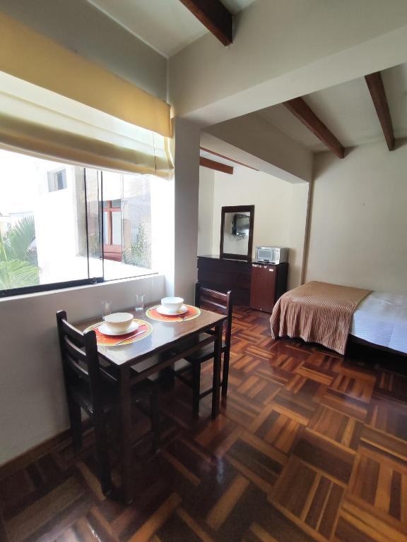 Ένα ή περισσότερα κρεβάτια σε δωμάτιο στο Amplia habitación independiente Larcomar