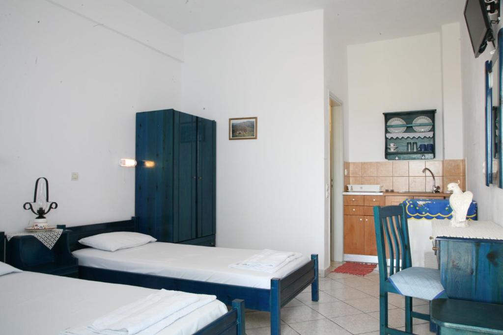 Postel nebo postele na pokoji v ubytování Panselinos