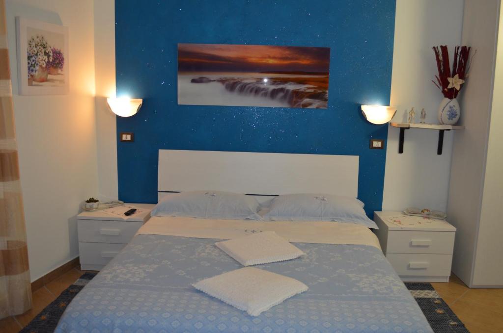 Postel nebo postele na pokoji v ubytování La Gemma B&B