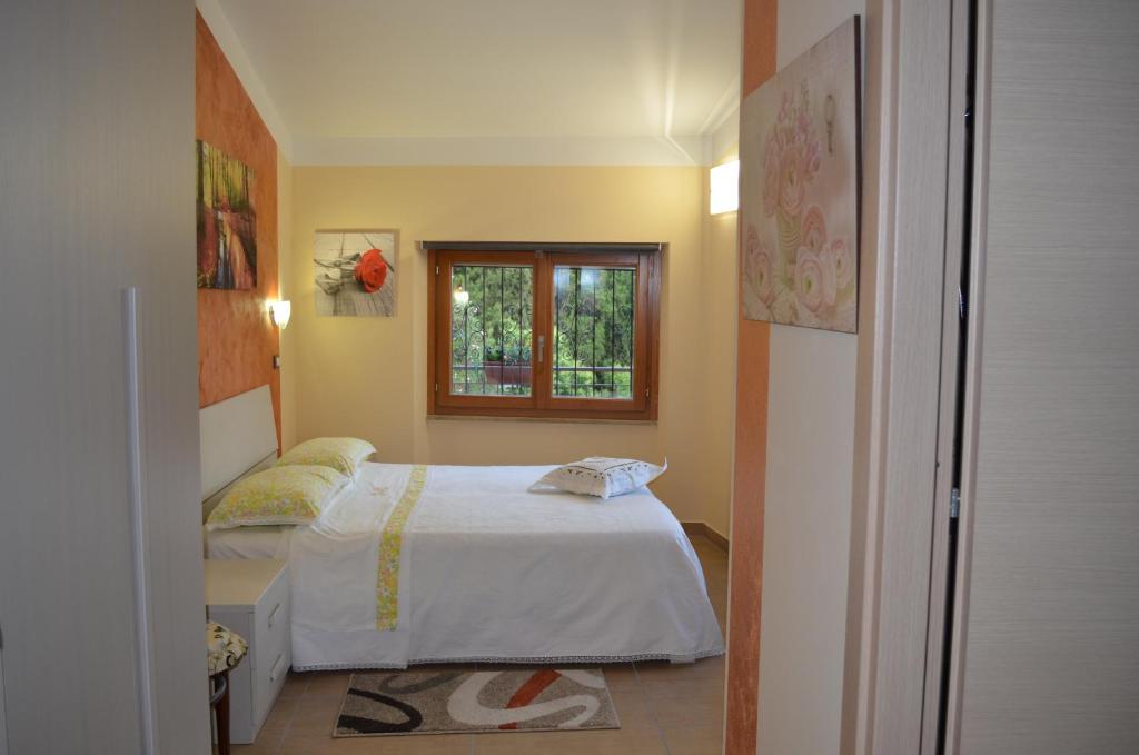 Postel nebo postele na pokoji v ubytování La Gemma B&B