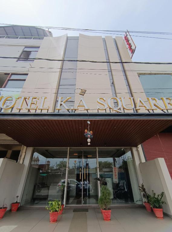 a sign on the front of a building at Hotel K A Square in Bhopal
