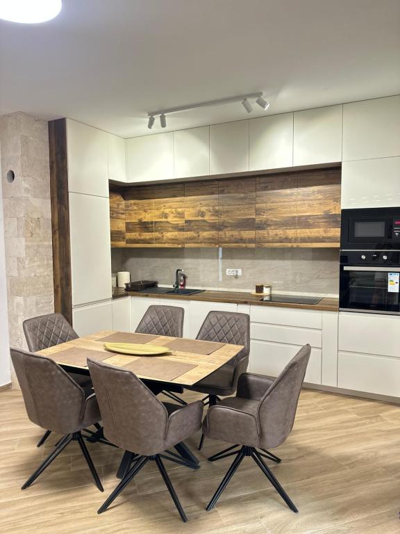 Kuchyň nebo kuchyňský kout v ubytování Vila Dusan