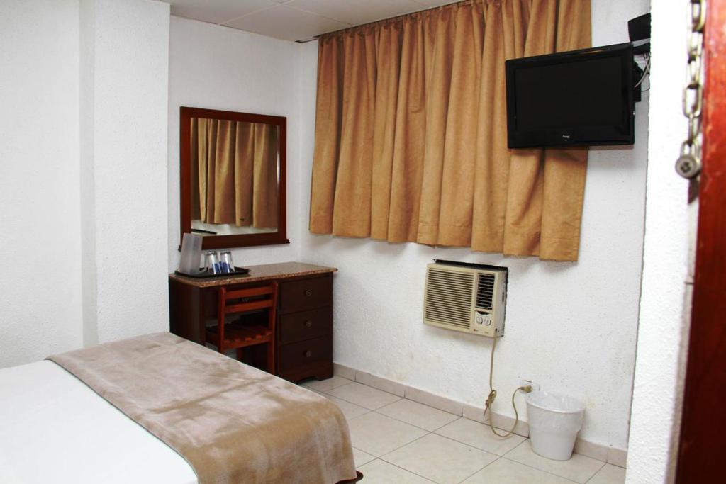 TV a/nebo společenská místnost v ubytování Hotel California Panama