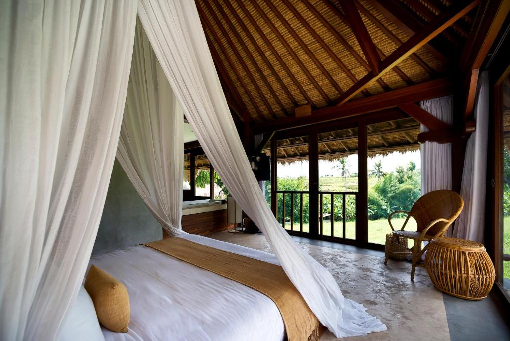 Postel nebo postele na pokoji v ubytování Planta Boutique Resort