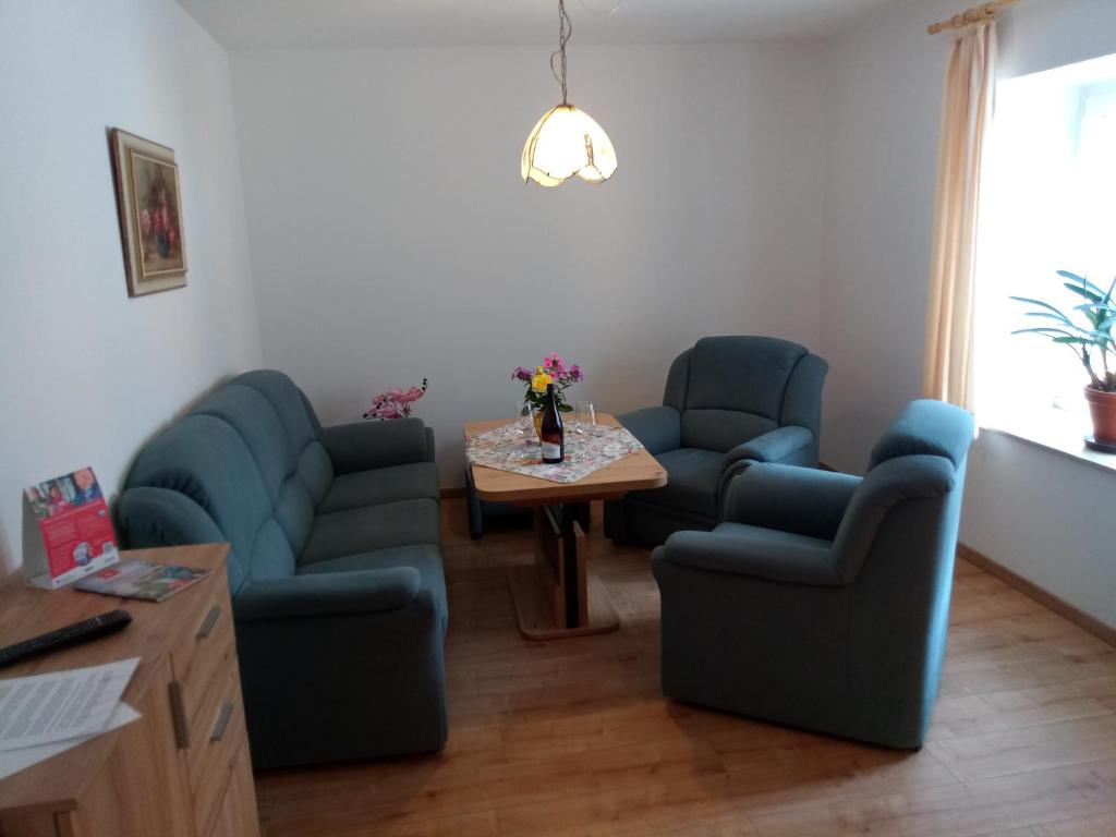 Posezení v ubytování Ferienwohnung Kuhstall