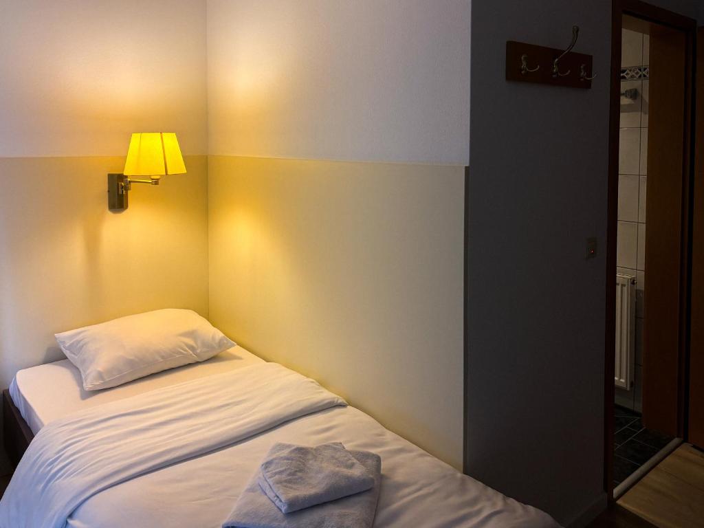 Stadthotel Kolpinghaus - Vier Ecken - Deluxe Eenpersoonskamer