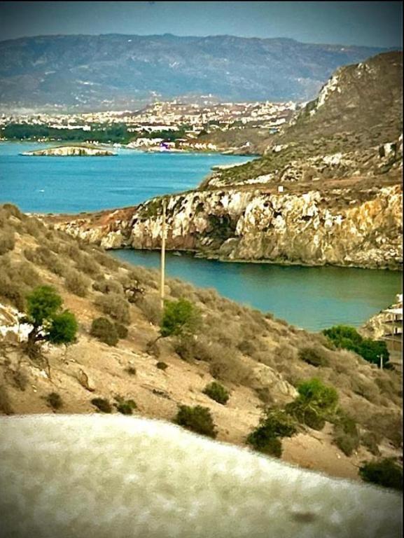 a view of a body of water next to a mountain at Hoceima in Al Hoceïma