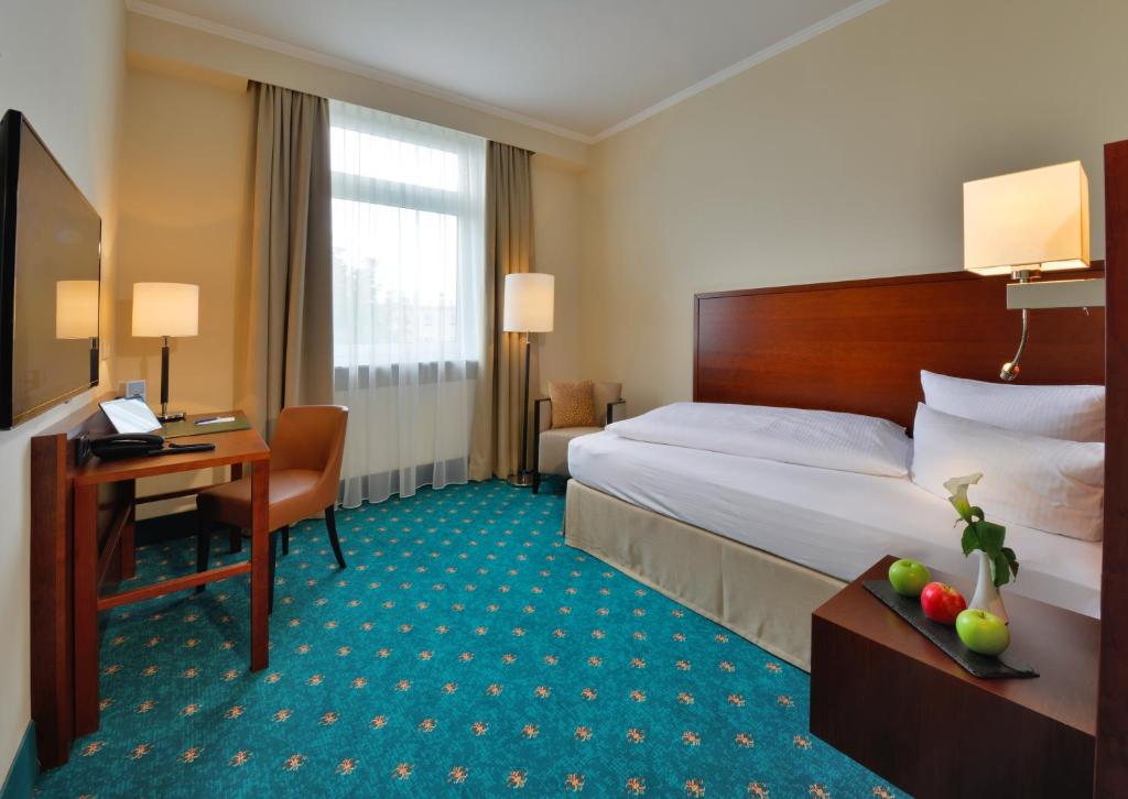 Voodi või voodid majutusasutuse Hotel Der Lindenhof toas