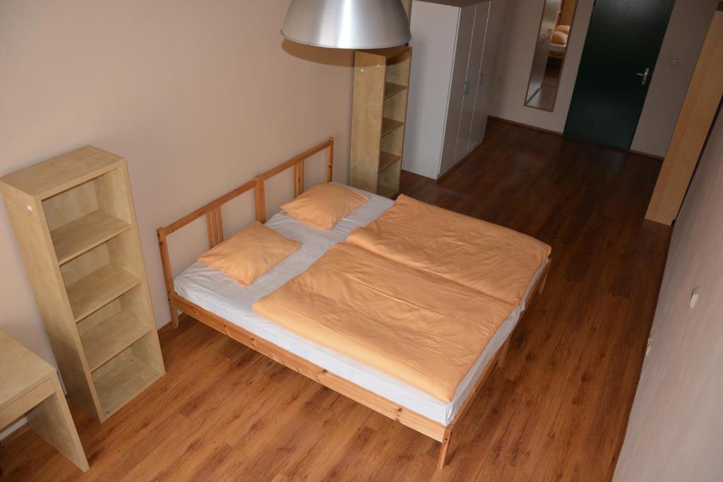 Postel nebo postele na pokoji v ubytování Apartments 163/I