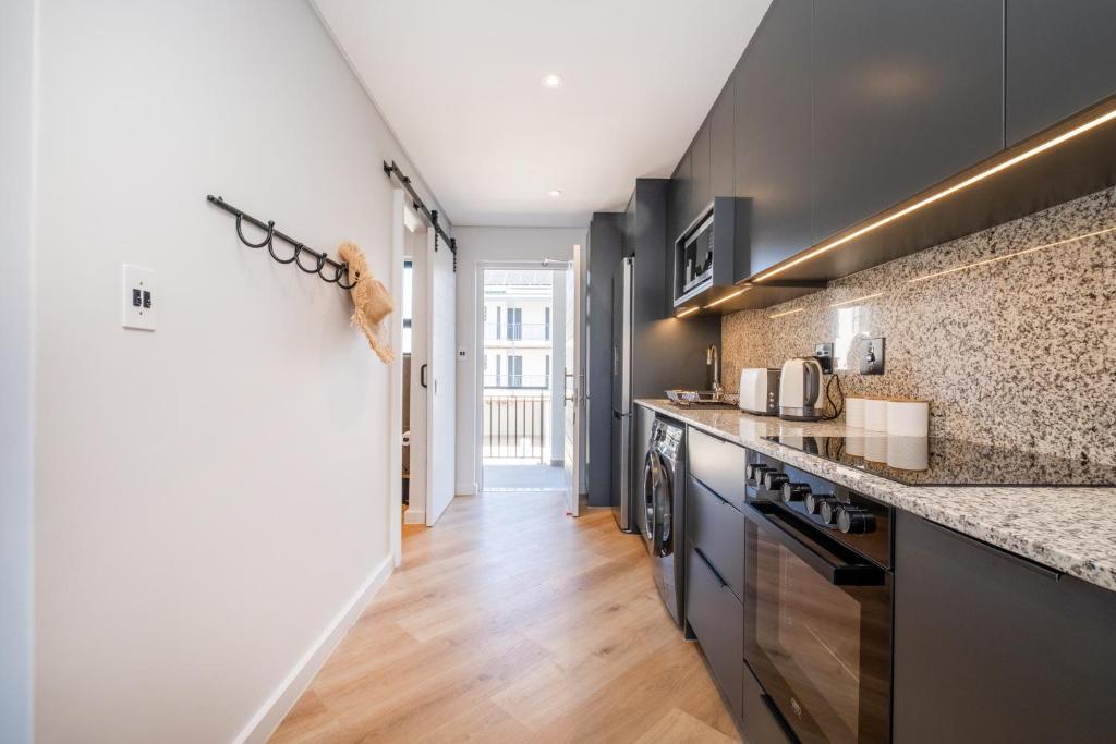 Η κουζίνα ή μικρή κουζίνα στο 136 Paarl Studio With Onsite Parking Comforts