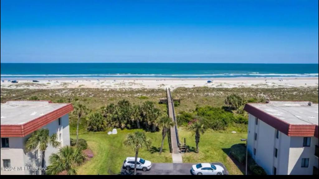 an aerial view of a building and the beach at St Augustine Beach Condo in Saint Augustine