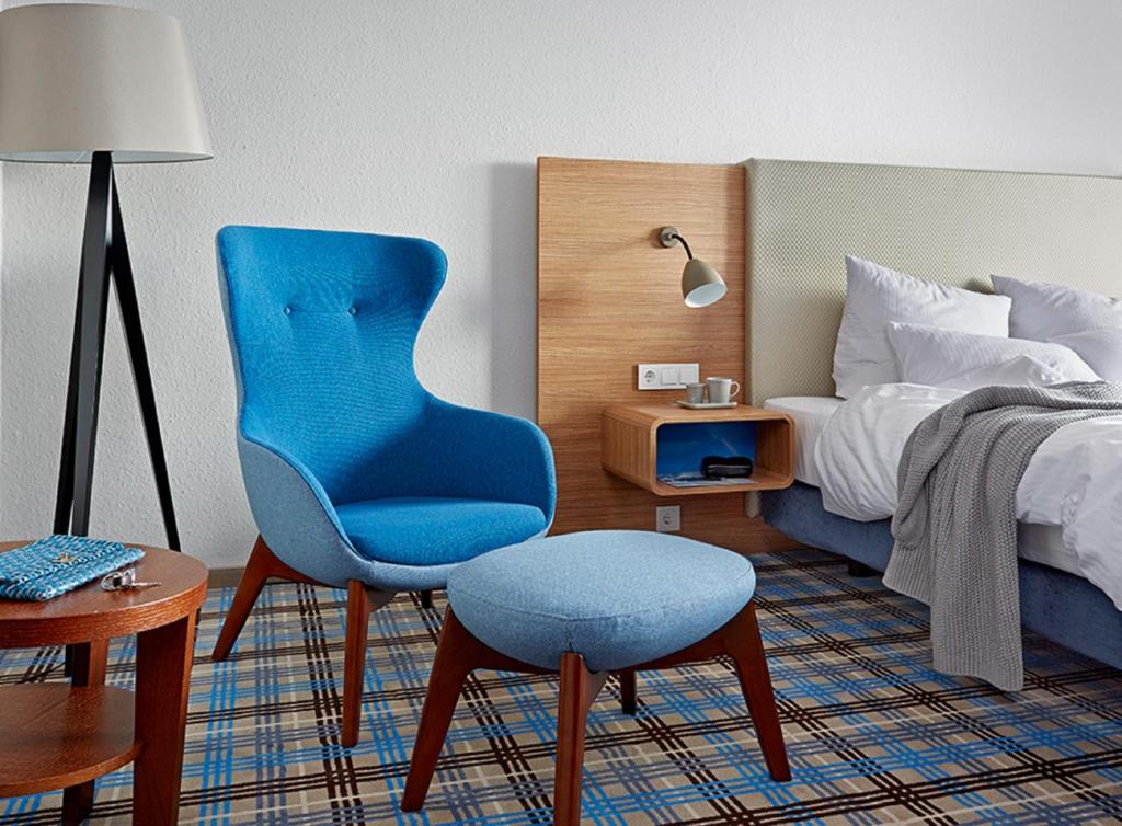 Postel nebo postele na pokoji v ubytování Seaside Residenz Hotel Chemnitz