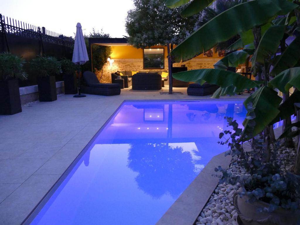 Swimmingpoolen hos eller tæt på Appartement avec piscine privée