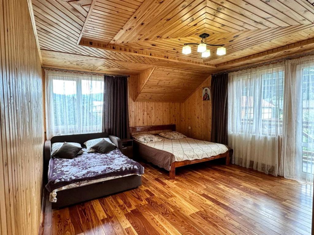 Кровать или кровати в номере За рікою