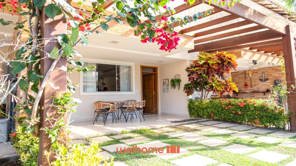 Zahrada ubytování Casa em Serra a 2 min da praia com lazer completo