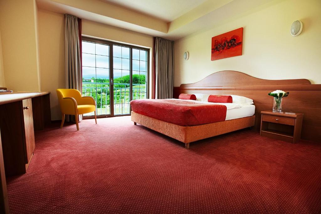 Postel nebo postele na pokoji v ubytování Hotel Venko