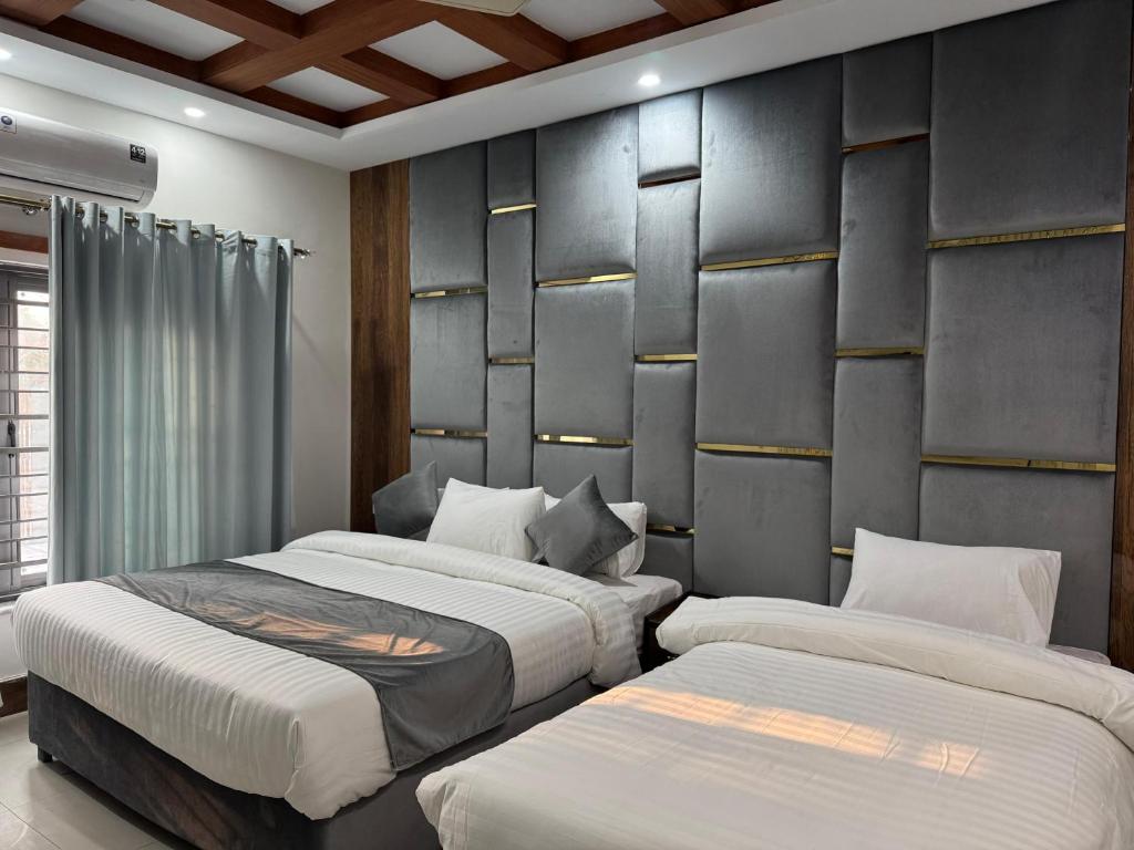 Ένα ή περισσότερα κρεβάτια σε δωμάτιο στο Arizona Haven Guesthouse