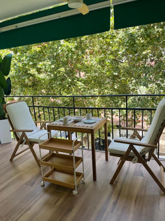 a table and two chairs on a balcony at Marbella-abc-aparts in Marbella