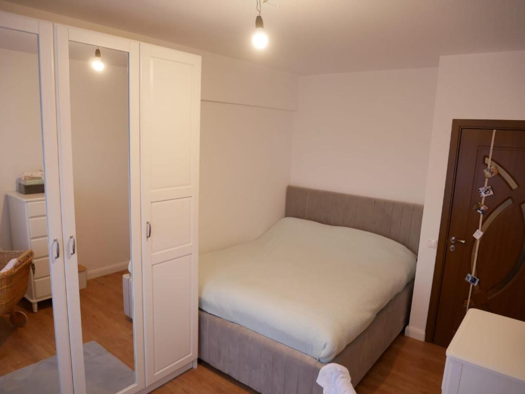 Postel nebo postele na pokoji v ubytování Apartament Vis Ramiro