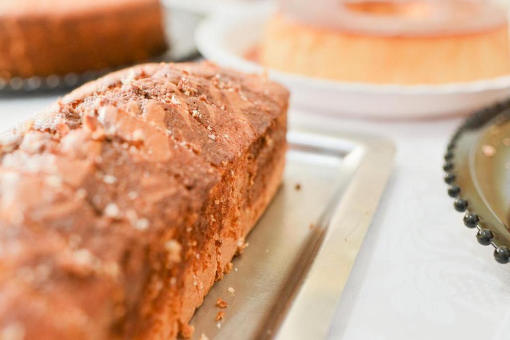 a close up of a piece of cake on a plate at Hotel Palace Huesca in Presidente Prudente