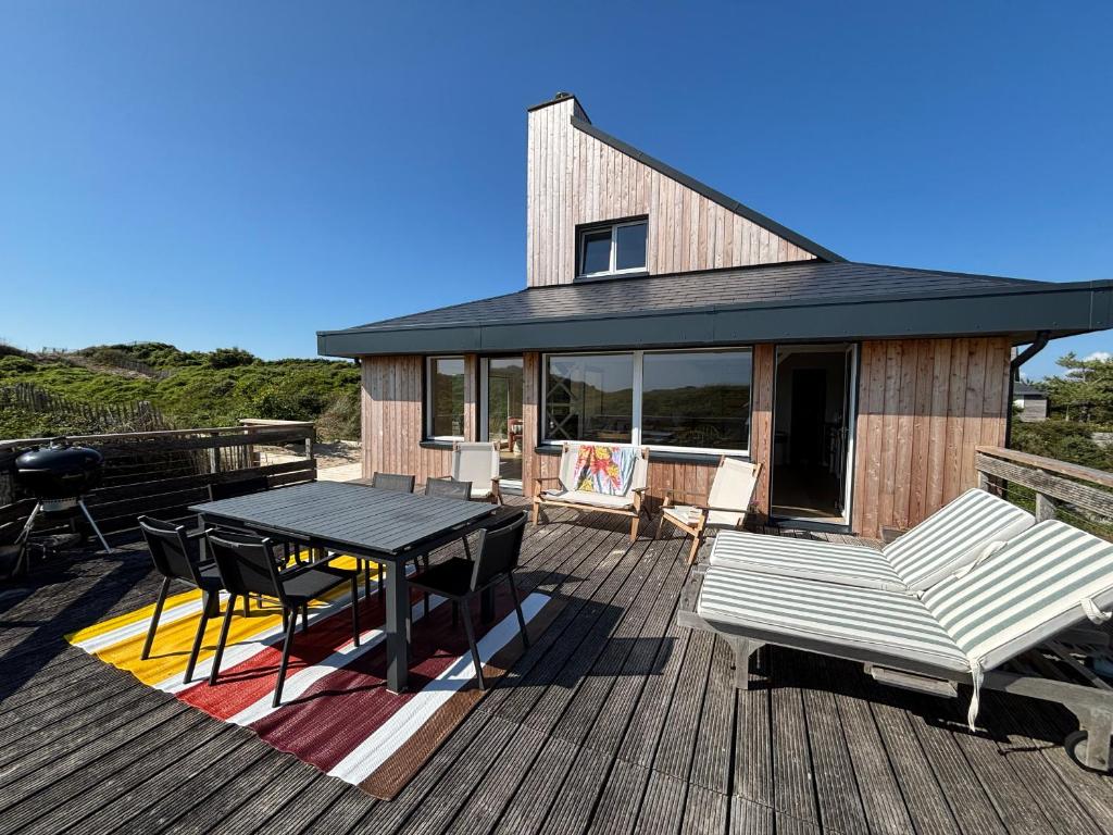 Μπαλκόνι ή βεράντα στο Maison dans les dunes à 150m de la plage pour 7 personnes - FR-1-482-159