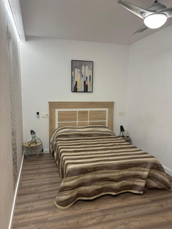 Postel nebo postele na pokoji v ubytování Apartamento blanco y negro en el centro
