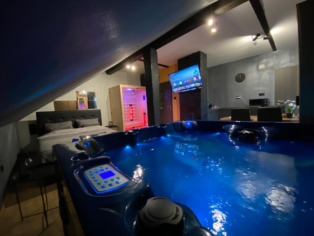 a large blue tub with a cell phone in it at Wellness & Spa Zaprešić in Jablanovec