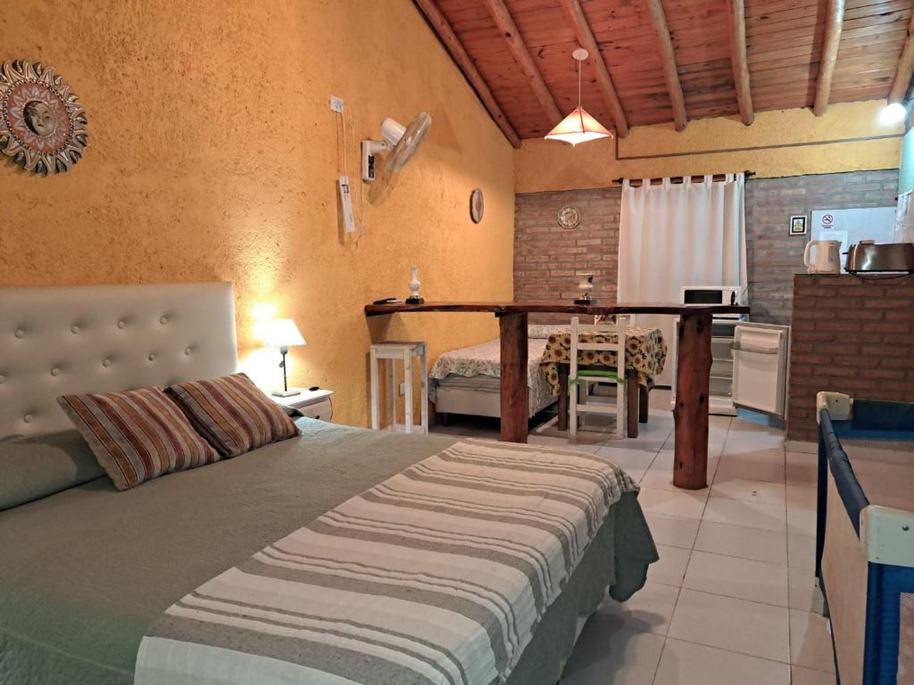 Postel nebo postele na pokoji v ubytování complejo inti sumah