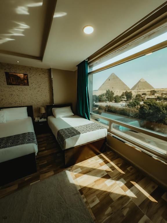 Turquoise Pyramids & Grand Egyptian museum view Hotel - 16