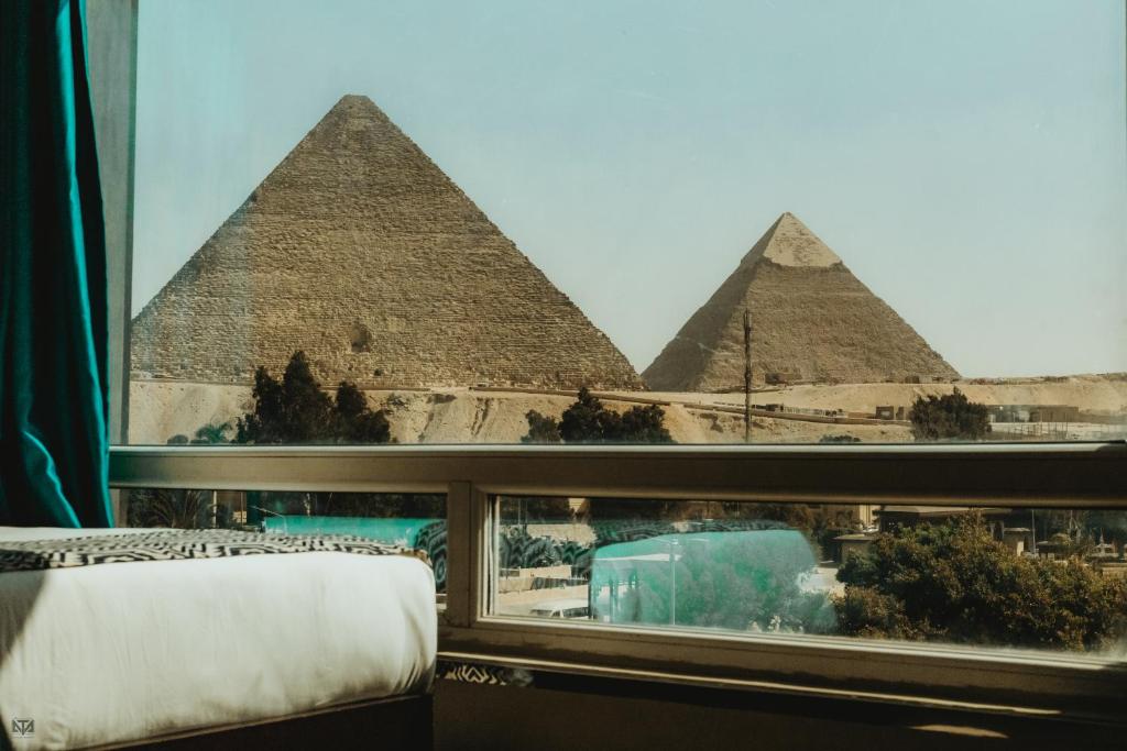 Turquoise Pyramids & Grand Egyptian museum view Hotel - 12