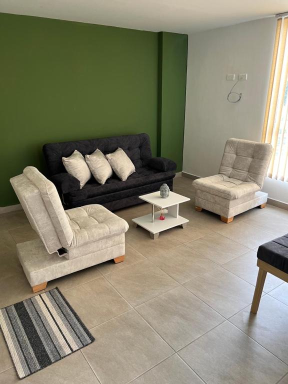 Χώρος καθιστικού στο Carretera a los Nevados y Termales