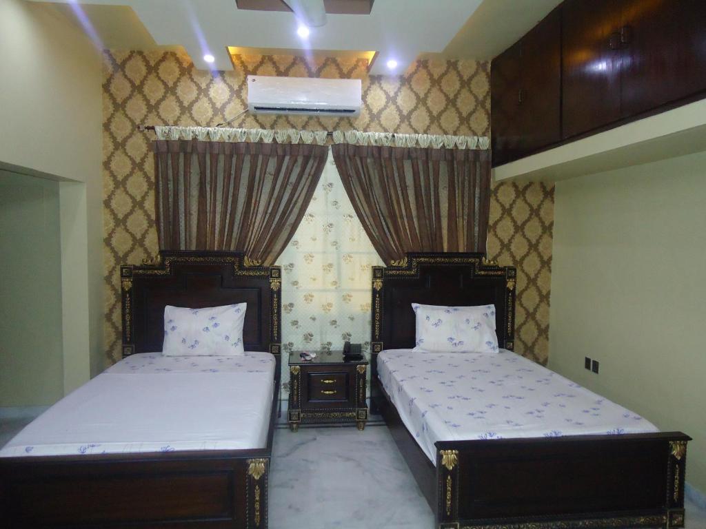 Patel Residency Guest House - Habitación Gemela De Lujo
