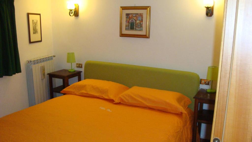 Postel nebo postele na pokoji v ubytování B&B Villa Tina