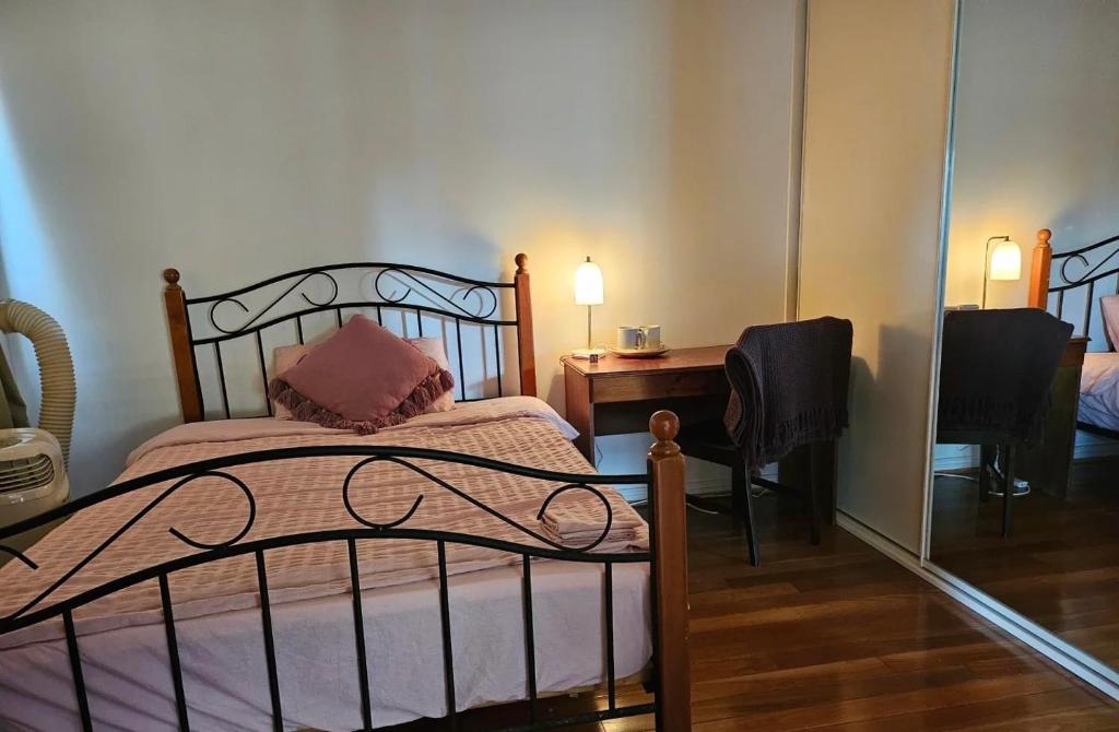 Ένα ή περισσότερα κρεβάτια σε δωμάτιο στο Vacation Home