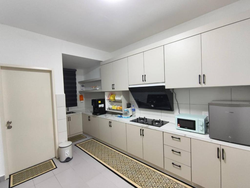 Kuchyň nebo kuchyňský kout v ubytování LS Homestay Sireh Residence Kota Bharu