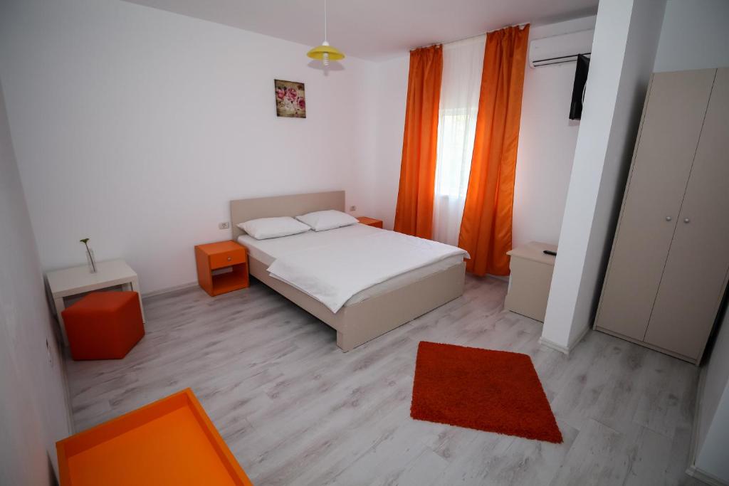 Postel nebo postele na pokoji v ubytování Hotel Atlantis