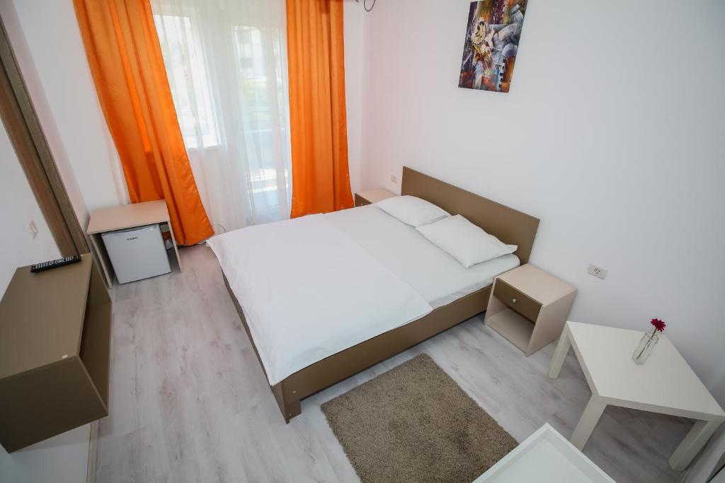 Postel nebo postele na pokoji v ubytování Hotel Atlantis