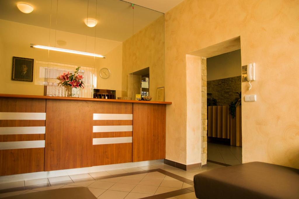 Vstupní hala nebo recepce v ubytování Studia a apartmány U Karla
